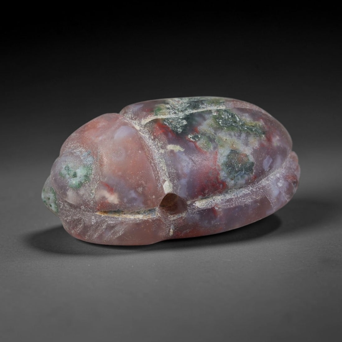 Ancient Pharaonic Egyptian Agate Scarab Amulet Bead (3100 BCE-30 CE), 32FV: This antique scarab amulet bead is carved from natural agate, originating from Pharaonic Egyptian culture. Scarabs were sacred protective talismans closely linked to rebirth and eternal life within an