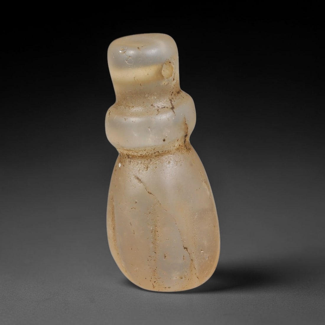 Ancient Medieval Coptic Christian Egyptian Culture Rock Crystal Amulet (300-1000 CE), 65EG: This antique rock crystal amulet originates from Coptic Christian Egyptian Culture, a region with a long-standing tradition of crafting translucent hardstone talismans for devotional and funerary use.