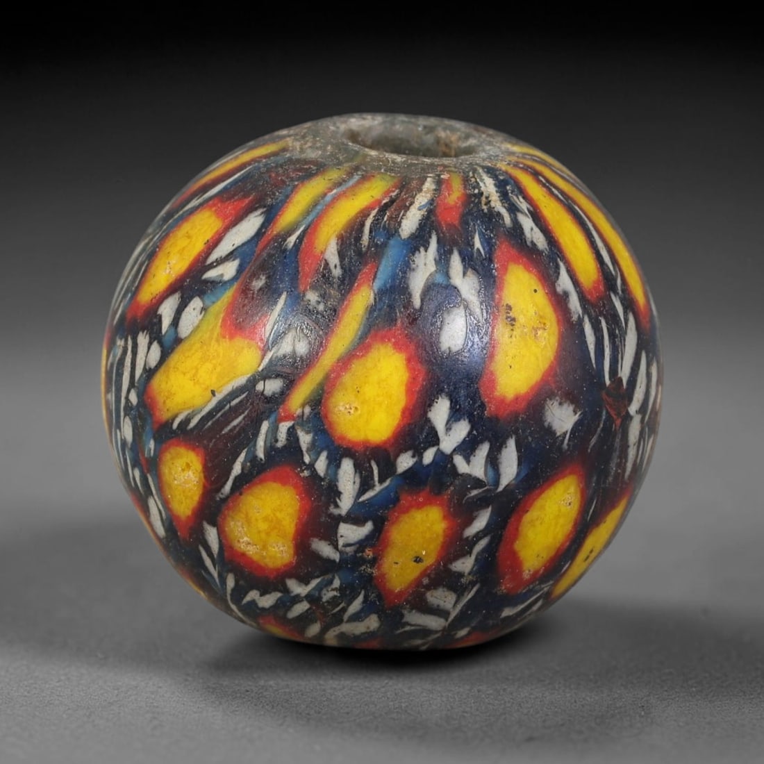 Antique Borneo Glass Trade Bead - 18mm Vintage Handcrafted Bead, 2AA: Antique Borneo glass beads hold deep cultural and historical significance within Southeast Asian maritime trade networks. For centuries, these glass spheres circulated as vital currency, ceremonial ta