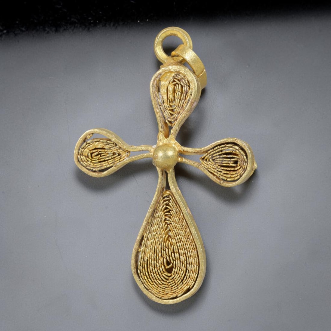 Vintage Ethiopian Copper Alloy Cross Pendant, 30EJ: Crafted from copper alloy, this traditional Ethiopian cross pendant features integrated suspension loop for wear. Shows authentic surface patina consistent with vintage origin. Dimensions: 4.5x3cm. So