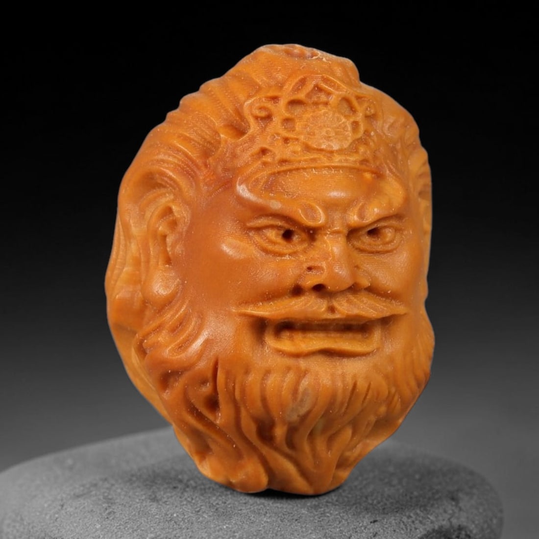 A Chinese Carved Natural Olive Nut Drilled Art Bead, 37BZ: Traditional craft bead carved from solid natural olive nut core, representing a classic miniature Chinese micro-carving folk art piece with a pre-drilled suspension bore integrated for easy threading 