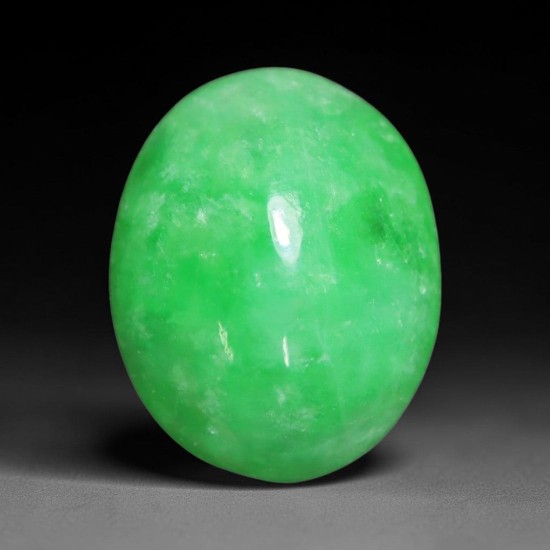 2.31ct Natural Burmese Type A Jadeite Jade Cabochon Loose Gemstone, 49BT: This smoothly polished cabochon is genuine Type A Burmese jadeite jade. It displays soft, even green saturation with gentle natural tonal variation across the polished surface, featuring a fine compac
