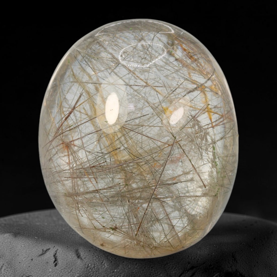 19ct Natural Brazilian Black Rutile Quartz Cabochon Loose Gemstone, 56BM: This polished cabochon of natural rutile quartz features countless distinct slender black rutile needle inclusions suspended within the clear quartz host crystal. The smooth domed surface enables full