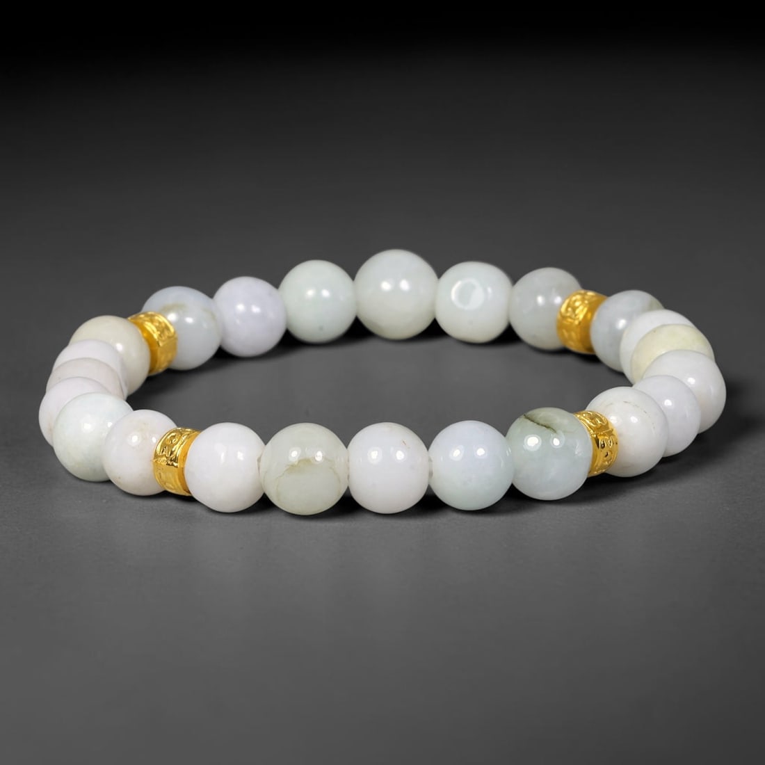 Natural Burmese Type A Jadeite Jade Beaded Bracelet, 30EP: Polished natural jadeite jade round beads complemented by decorative crystal spacer accents. Uniform 8mm beads form a flexible wearable strand. A timeless gemstone bracelet suitable for daily styling,