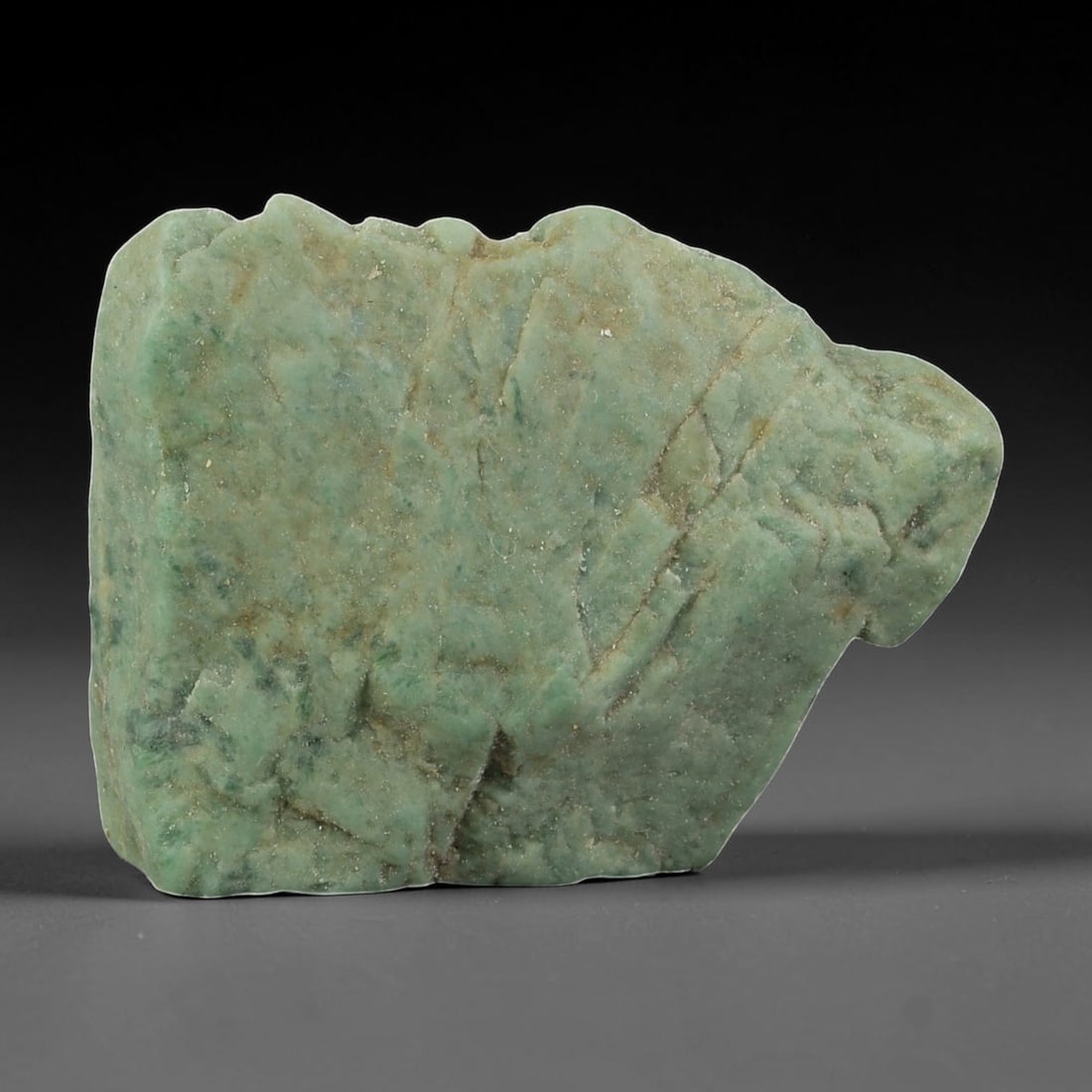 130Ct Natural Type A Burmese Jadeite Jade Cutter Rough Stone, 36EA: This is a natural Type A Burmese Jadeite Jade cutter rough stone, measuring 3.8x2.8cm, suitable for carving or as a collectible raw material. The stone features a muted light green base with natural d