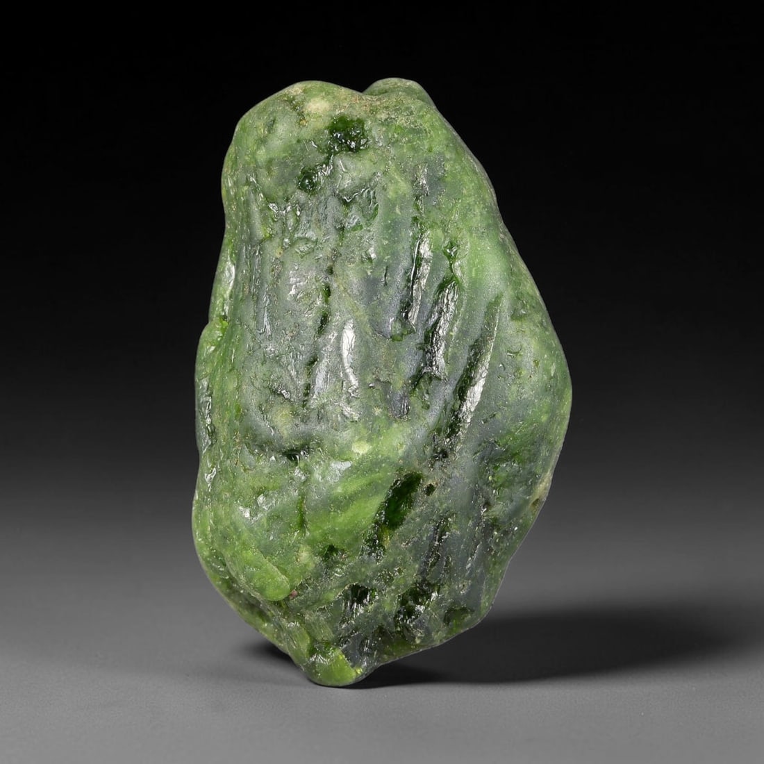 184ct Natural Russian Siberian Deep Forest Green Chrome Diopside Rough, 100AH: This substantial uncut chrome diopside rough features rich saturated forest green color boosted by natural chromium deposits, creating vivid emerald-hued translucency across its textured raw surface, 