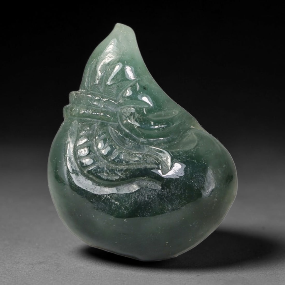 Natural Burmese Type A Jadeite Jade Hand Carved Pendant, 75BL: Artisan hand-carved untreated Burmese Type A jadeite jade pendant measuring 26x20 mm. Carefully sculpted with detailed relief craftsmanship and finished with a smooth glossy polish. Authentic Type A j