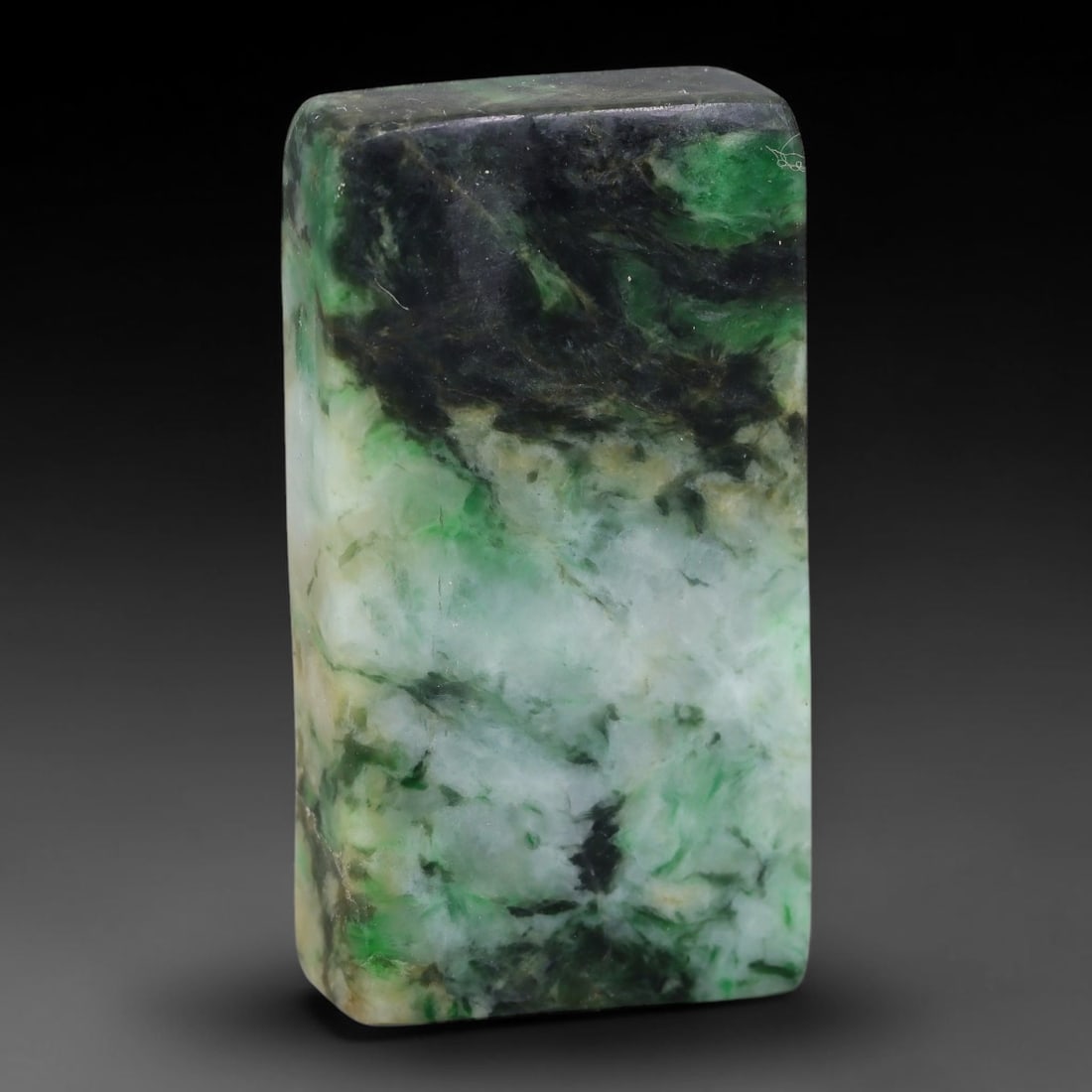 192ct Natural Type A Burmese Jadeite Jade Sliced Rough, 10FB: This specimen is a sliced rough block of natural Type A Burmese jadeite jade. The interior displays natural colour zoning with visible mineral veining and crystalline patterns typical of unprocessed j