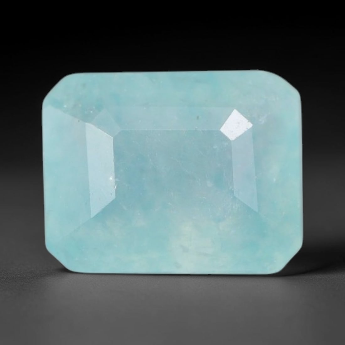 1.35ct Natural Madagascan Faceted Grandidierite Rare Loose Gemstone, 75AS: This expertly faceted finished grandidierite holds soft translucent body tone with fine faint natural internal veining visible beneath precisely cut reflective facets within its 7.6x5.7x3.8mm calibrat