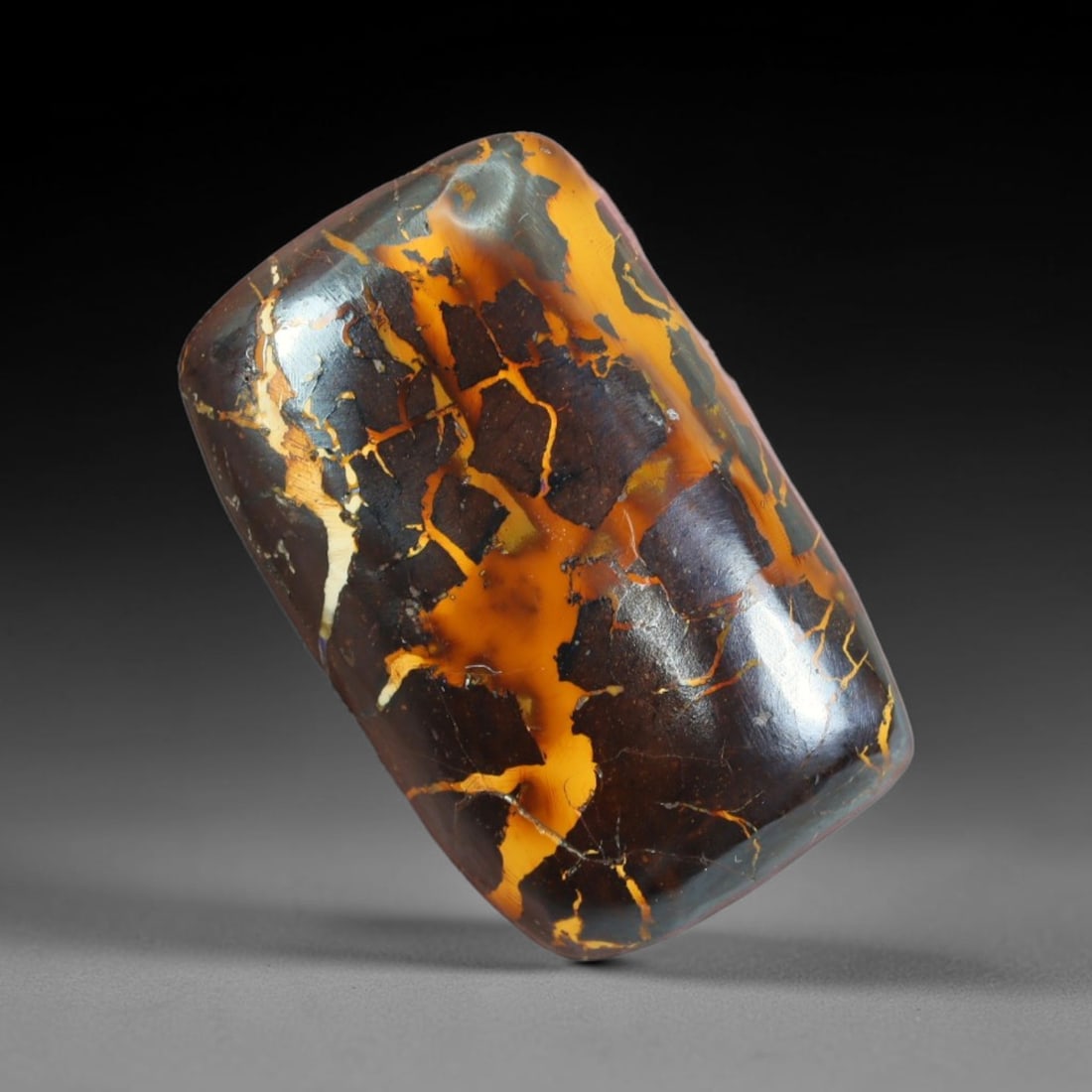 19.28ct Natural Australian Queensland Matrix Boulder Opal Cabochon, 72AT: Hand polished freeform rectangular cushion cabochon formed from natural Queensland matrix boulder opal, featuring deep dark ironstone host rock interlaced with thick, saturated golden-amber opal vein 