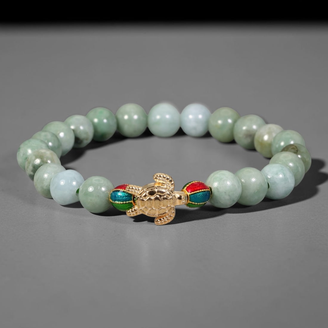 Natural Burmese Type A Jadeite Jade Beaded Bracelet, 22FJ: Constructed from polished natural jadeite jade round beads paired with decorative accent elements. The bracelet measures 8cm, assembled as a flexible wearable strand. Simple and elegant, suitable for 