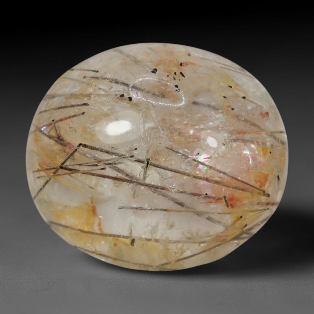 20ct Natural Brazilian Black Rutile Quartz Cabochon Loose Gemstone, 12BP: This polished cabochon of natural rutile quartz features countless distinct slender black rutile needle inclusions suspended within the clear quartz host crystal. The smooth domed surface enables full
