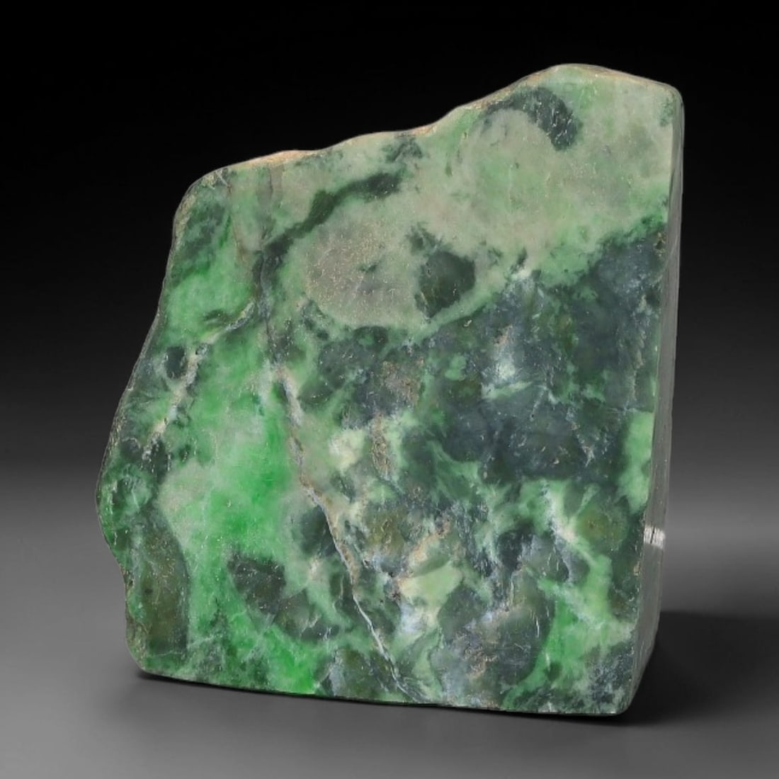 145ct Natural Type A Burmese Jadeite Jade Sliced Rough, 3AZ: This specimen is a sliced rough block of natural Type A Burmese jadeite jade. The interior displays natural colour zoning with visible mineral veining and crystalline patterns typical of unprocessed j