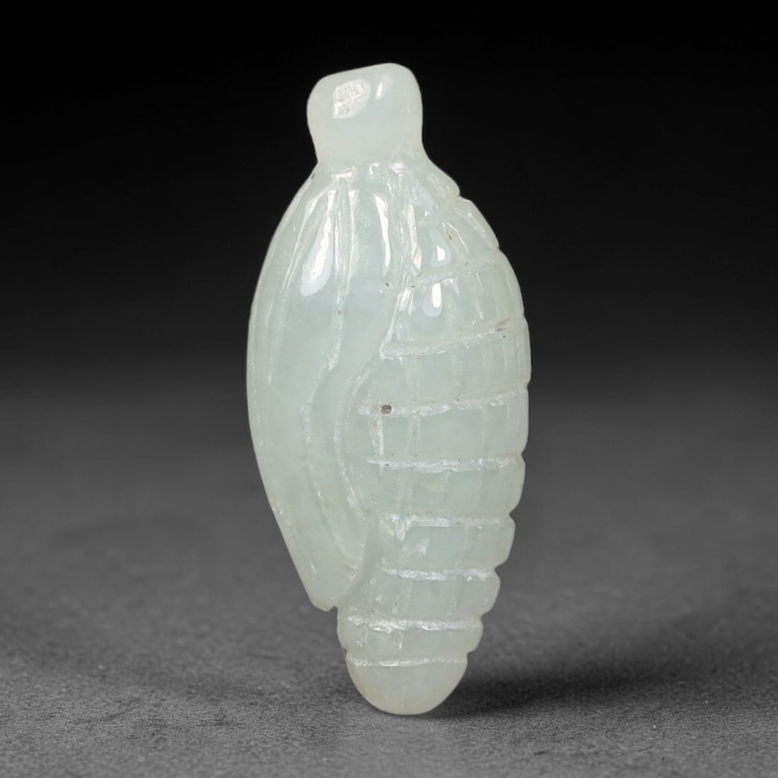 Natural Burmese Type A Jadeite Jade Hand Carved Pendant, 57BS: Artisan hand-carved untreated Burmese Type A jadeite jade pendant measuring 26x11 mm. Carefully sculpted with detailed relief craftsmanship and finished with a smooth glossy polish. Authentic Type A j