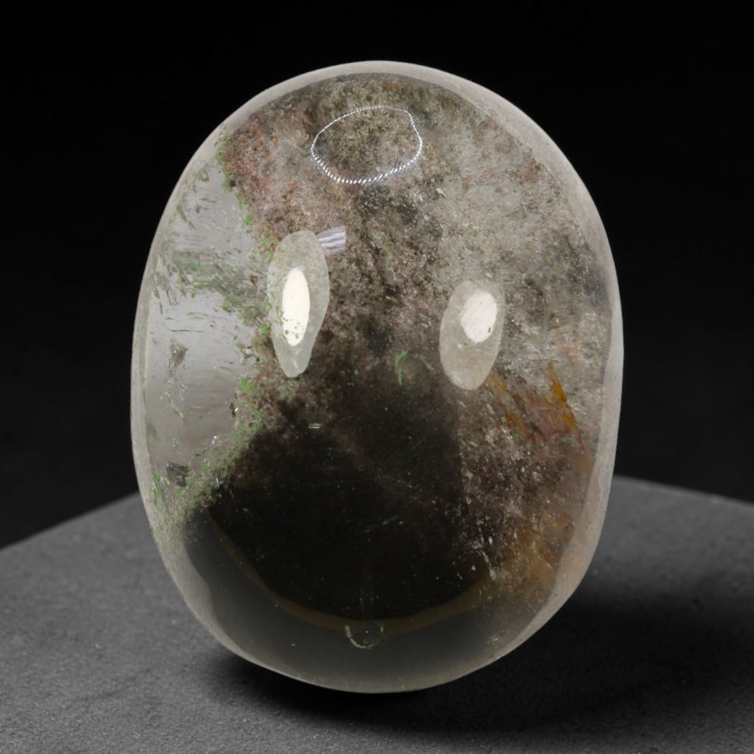 34ct Natural Brazilian Phantom Quartz Oval Cabochon Loose Gemstone, 88BM: This smoothly polished cabochon of natural phantom quartz preserves delicate layered phantom crystal formations enclosed inside transparent quartz host. The domed polished surface offers unobstructed 