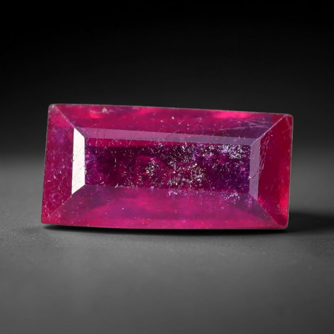 1.48 Carats Natural Madagascar Vivid Fuchsia Red Heated Ruby Loose Gemstone, 38FM: This vivid fuchsia red Madagascar ruby displays rich saturated red tone with subtle natural internal mineral traces that showcase genuine earth-grown character, measured at 9.1x4.5x3mm, the intense wa