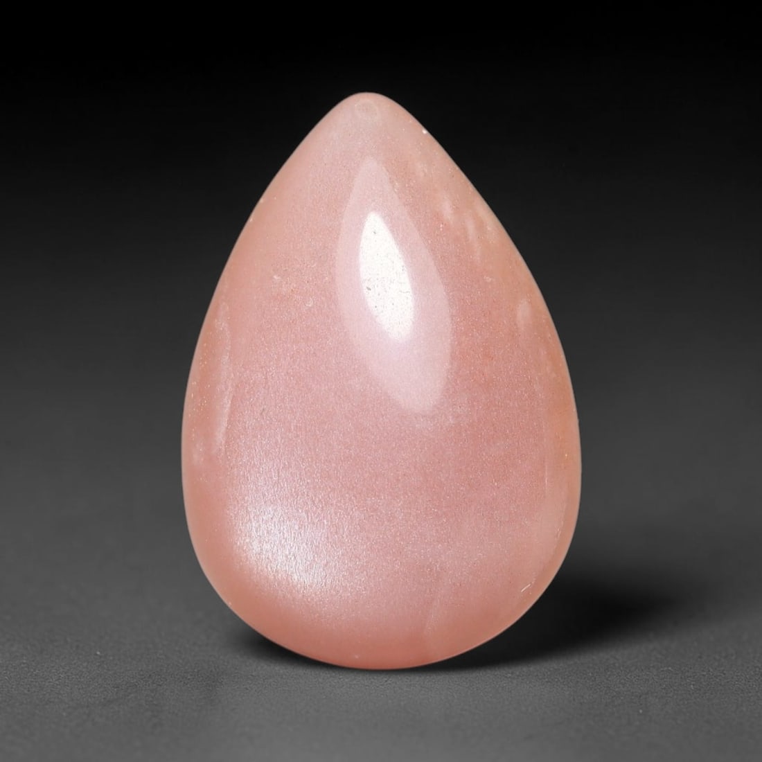 8.45ct Natural Ceylon Warm Peach Moonstone Loose Gemstone, 5FJ: This natural Ceylon moonstone has dimension measurements of 18x12x5mm, showcasing a smooth warm peach base tone paired with subtle soft adularescent sheen that glides gently across the polished surfac