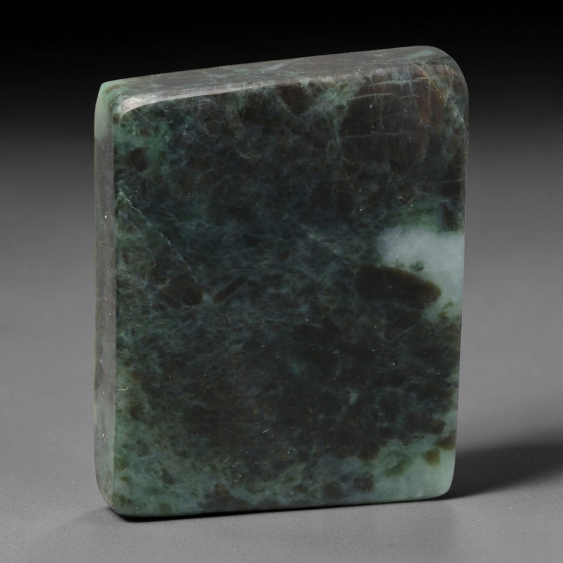 255ct Natural Type A Burmese Jadeite Jade Sliced Rough, 93EF: This specimen is a sliced rough block of natural Type A Burmese jadeite jade. The interior displays natural colour zoning with visible mineral veining and crystalline patterns typical of unprocessed j