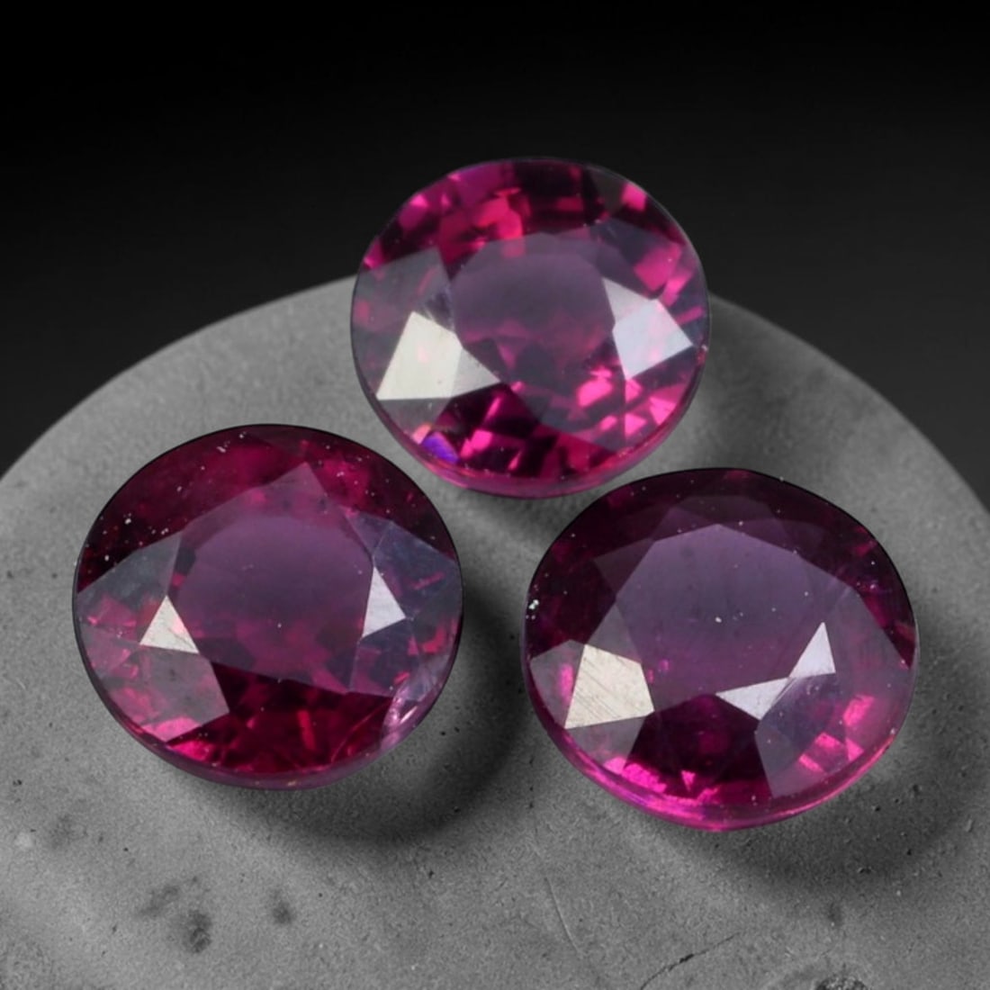 2.70ct Natural Tanzanian Rhodolite Garnet Loose Gemstone Parcel, 100BV: This parcel features natural rhodolite garnet sourced from Tanzania. The material carries attractive saturated purple-red tones within transparent crystal, finished with precise faceting that delivers