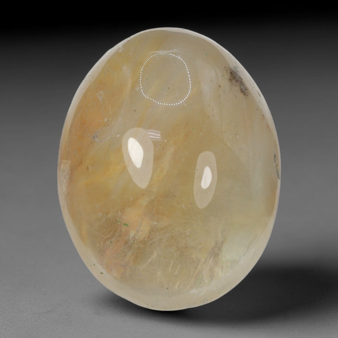 32ct Natural Brazilian Phantom Quartz Oval Cabochon Loose Gemstone, 32BM: This smoothly polished cabochon of natural phantom quartz preserves delicate layered phantom crystal formations enclosed inside transparent quartz host. The domed polished surface offers unobstructed 