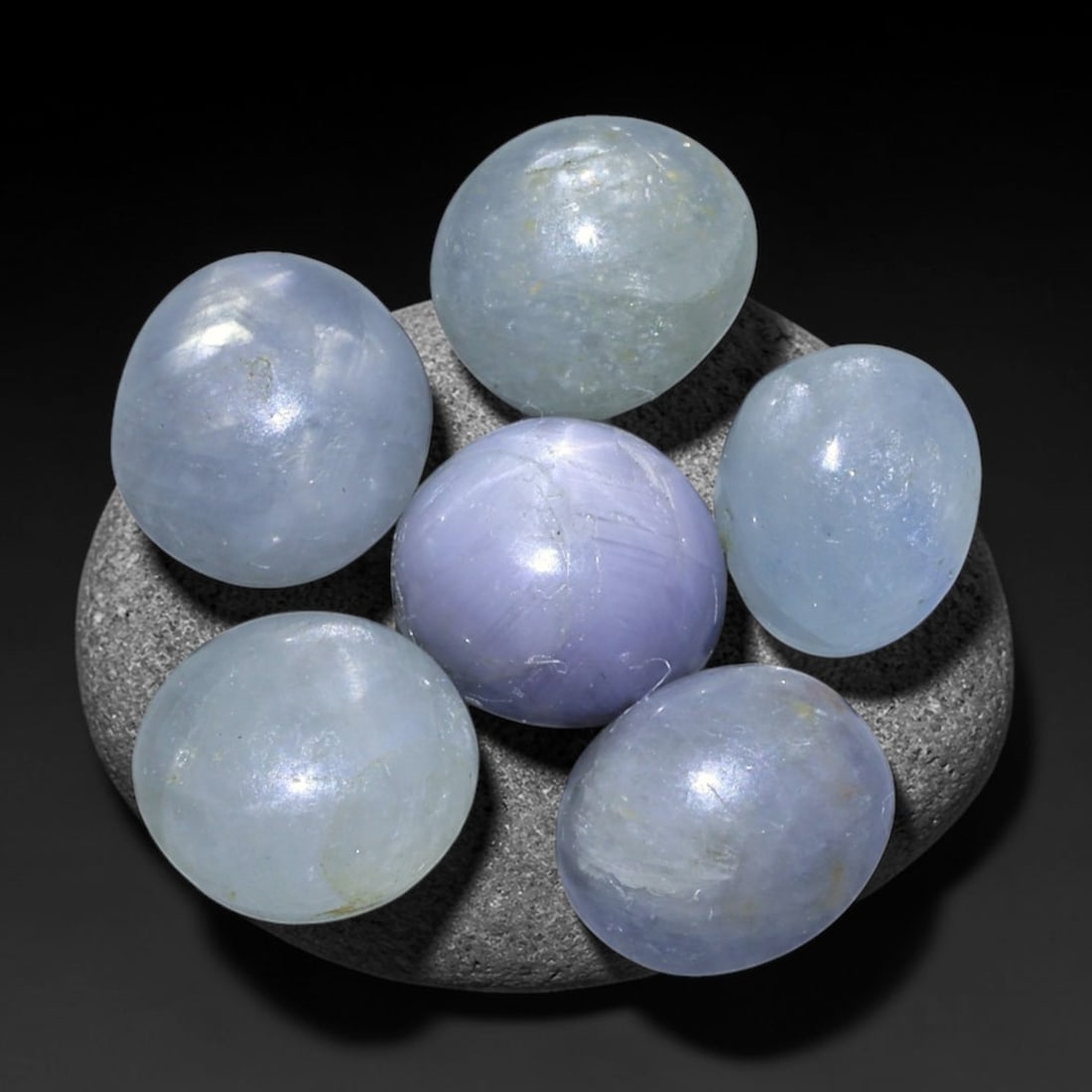 11.97ct Natural Unheated Burmese Star Sapphire Loose Gemstone Parcel, 68BZ: This parcel contains natural unheated star sapphire originating from Myanmar. The gem material displays soft pale blue and lavender hues, with characteristic silk inclusions that create the desirable 