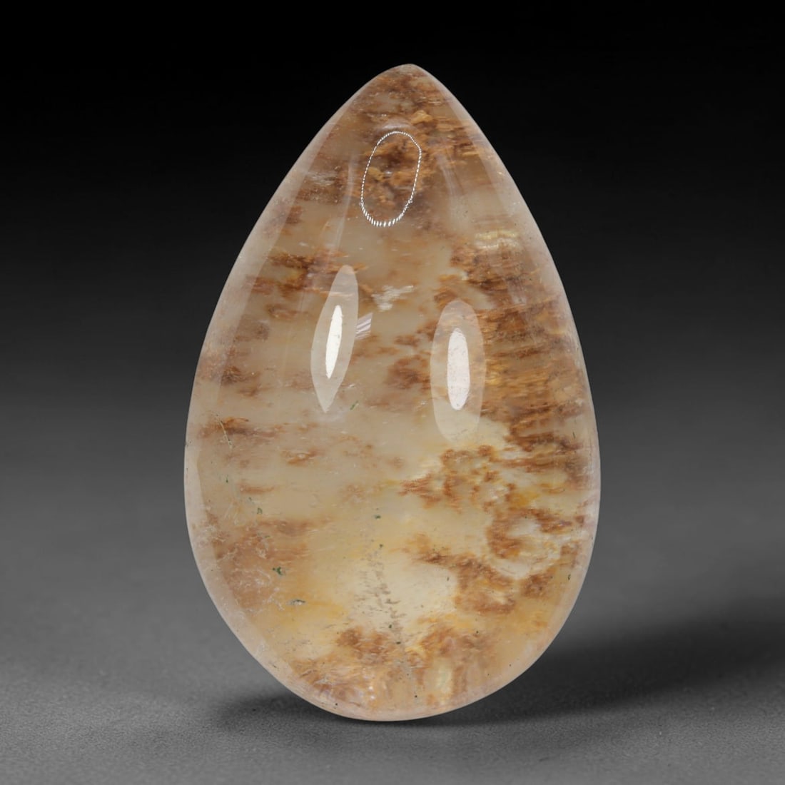 28ct Natural Brazilian Phantom Quartz Oval Cabochon Loose Gemstone, 10BP: This smoothly polished cabochon of natural phantom quartz preserves delicate layered phantom crystal formations enclosed inside transparent quartz host. The domed polished surface offers unobstructed 