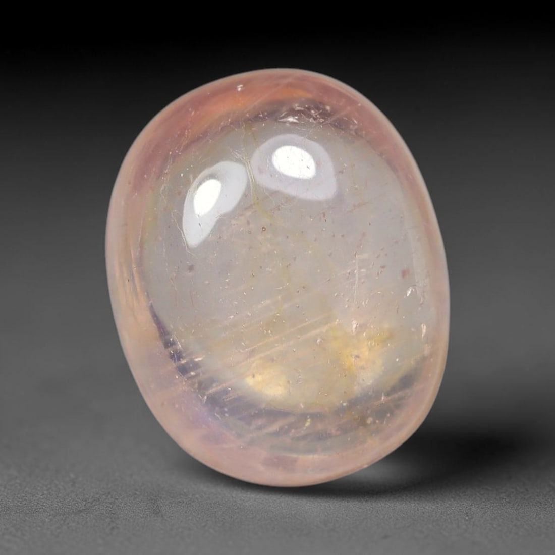 2.27ct Natural Sri Lankan Padparadscha Sapphire Loose Gemstone, 75BF: This fully polished Padparadscha sapphire features soft warm peach-orange blended body tone, with faint natural mineral traces scattered throughout its crystalline interior, measured at calibrated dim