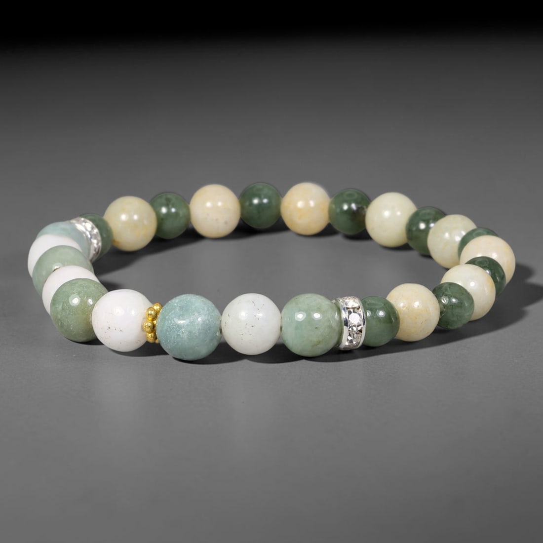 Natural Burmese Type A Jadeite Jade Beaded Bracelet, 24EP: Polished natural jadeite jade round beads complemented by decorative crystal spacer accents. Uniform 8mm beads form a flexible wearable strand. A timeless gemstone bracelet suitable for daily styling,