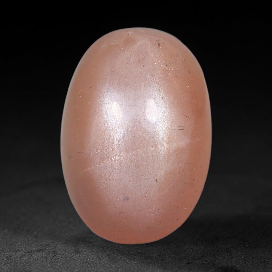 11.75 Carats Natural Ceylon Warm Peach Moonstone Loose Gemstone, 94FE: This natural Ceylon moonstone has dimension measurements of 17.8x12.2x8mm, showcasing a smooth warm peach base tone paired with subtle soft adularescent sheen that glides gently across the polished su