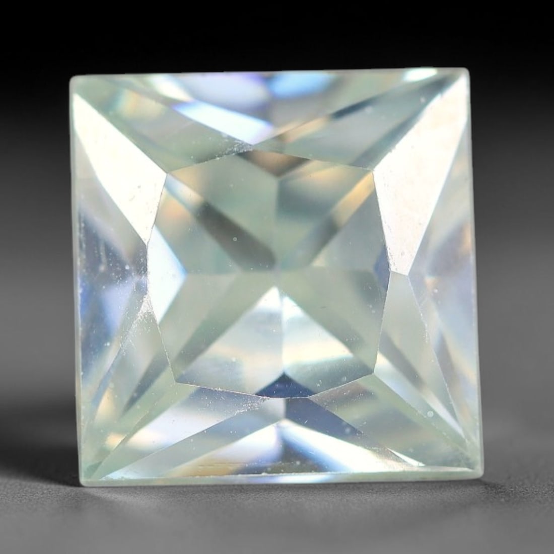 1.95 Carats Natural Cool White Moissanite Loose Gemstone, 84FM: This cool white moissanite holds dimension measurements of 7.5x4mm, delivering exceptional light dispersion that generates vivid rainbow sparkle across its fully transparent body, with faint microscop