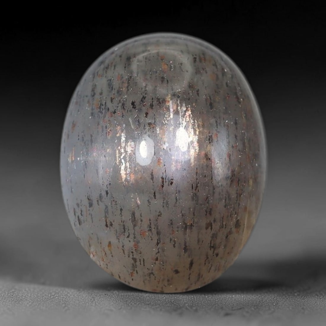 11.70 Carats Natural Australian Lattice Sunstone Cabochon Loose Gemstone, 8AG: This rich lattice sunstone boasts striking vertical mineral lattice inclusions, measured at 14.3x11.1x9.8mm, its earthy blended brown and peach base paired with vibrant multi-colored light reflections