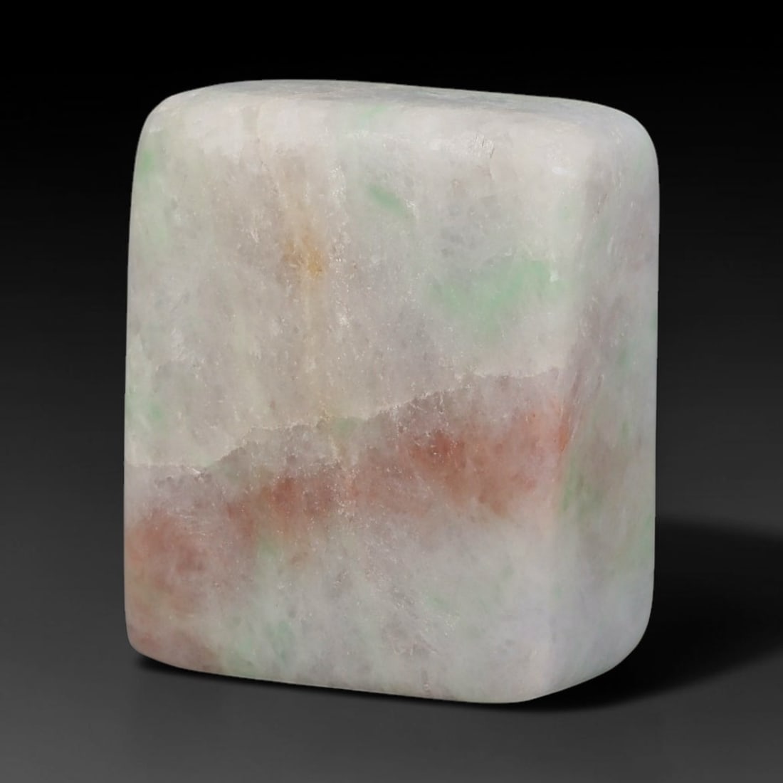 243ct Natural Type A Burmese Jadeite Jade Sliced Rough, 44FD: This specimen is a sliced rough block of natural Type A Burmese jadeite jade. The interior displays natural colour zoning with visible mineral veining and crystalline patterns typical of unprocessed j
