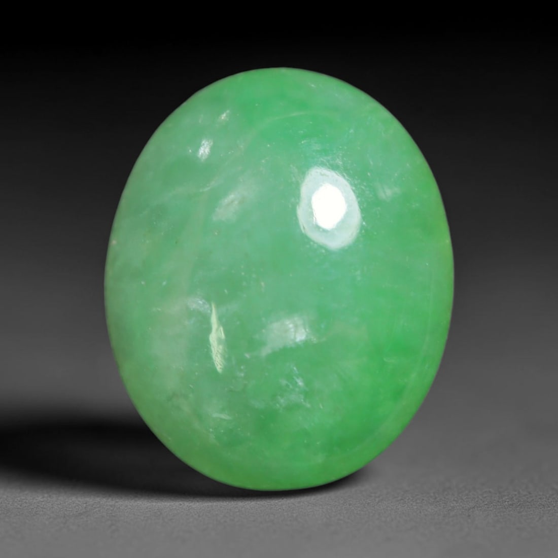2.82ct Natural Burmese Type A Jadeite Jade Cabochon Loose Gemstone, 54BT: This smoothly polished cabochon is genuine Type A Burmese jadeite jade. It displays soft, even green saturation with gentle natural tonal variation across the polished surface, featuring a fine compac