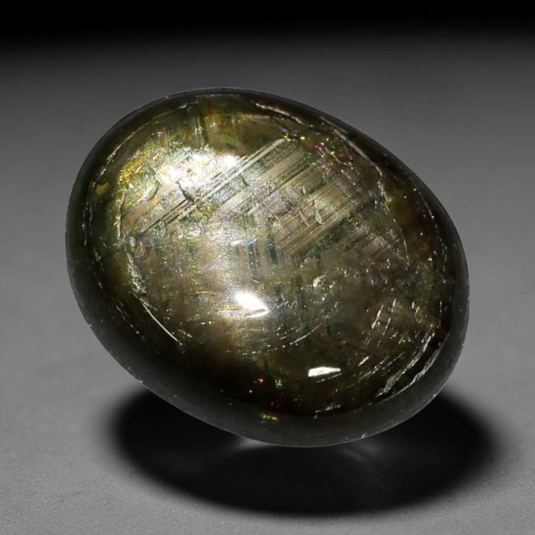 2.57ct Natural Siamese 6-Ray Black Star Sapphire Loose Gemstone, 64BX: This polished star sapphire originates from classic Siamese mining deposits, featuring a deep dark crystalline base with fine native mineral traces trapped within its structure, sized at calibrated 9x