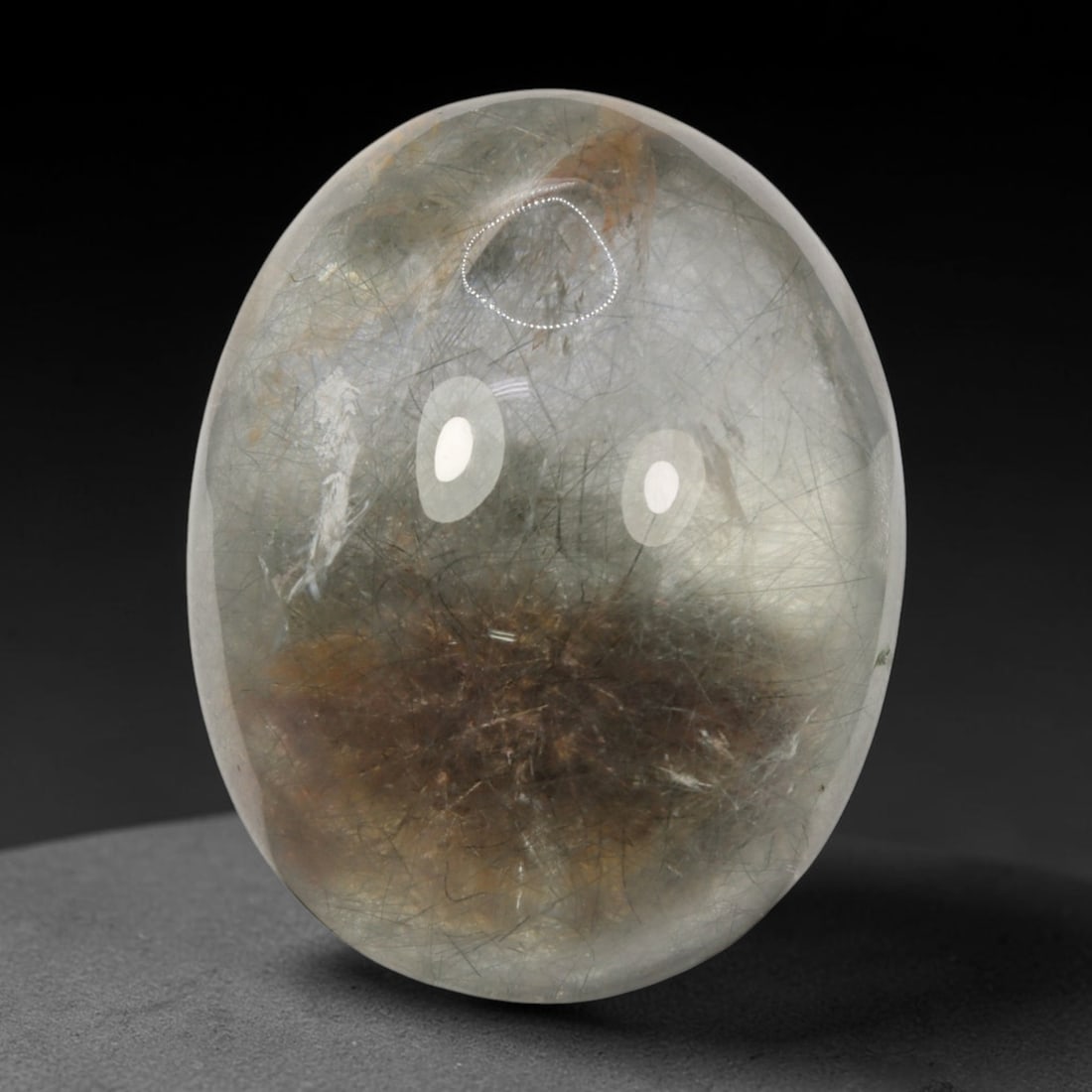 44ct Natural Brazilian Phantom Quartz Oval Cabochon Loose Gemstone, 50BM: This smoothly polished cabochon of natural phantom quartz preserves delicate layered phantom crystal formations enclosed inside transparent quartz host. The domed polished surface offers unobstructed 