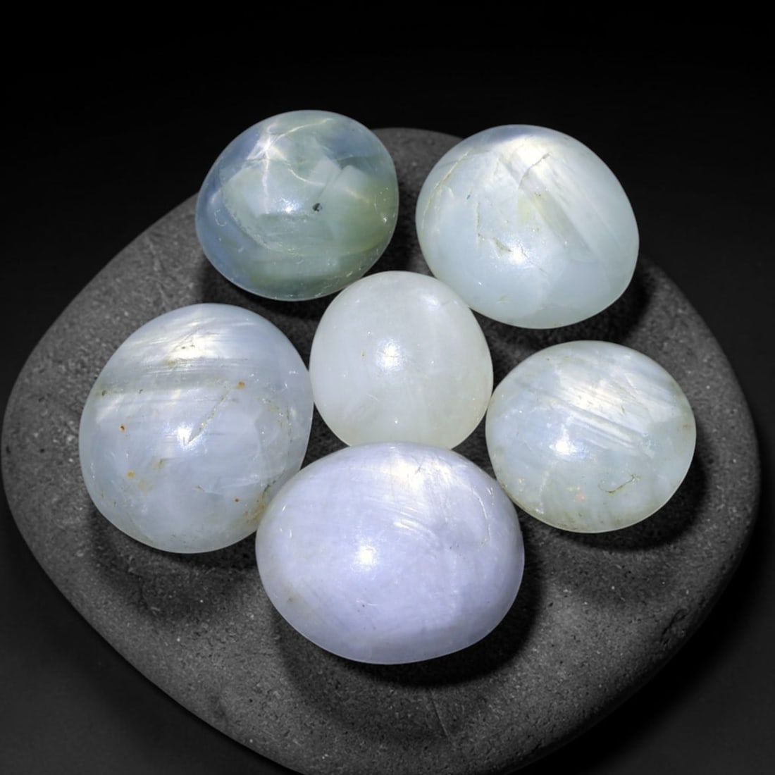 14.11ct Natural Unheated Burmese Star Sapphire Loose Gemstone Parcel, 86BZ: This parcel contains natural unheated star sapphire originating from Myanmar. The gem material displays soft pale blue and lavender hues, with characteristic silk inclusions that create the desirable 