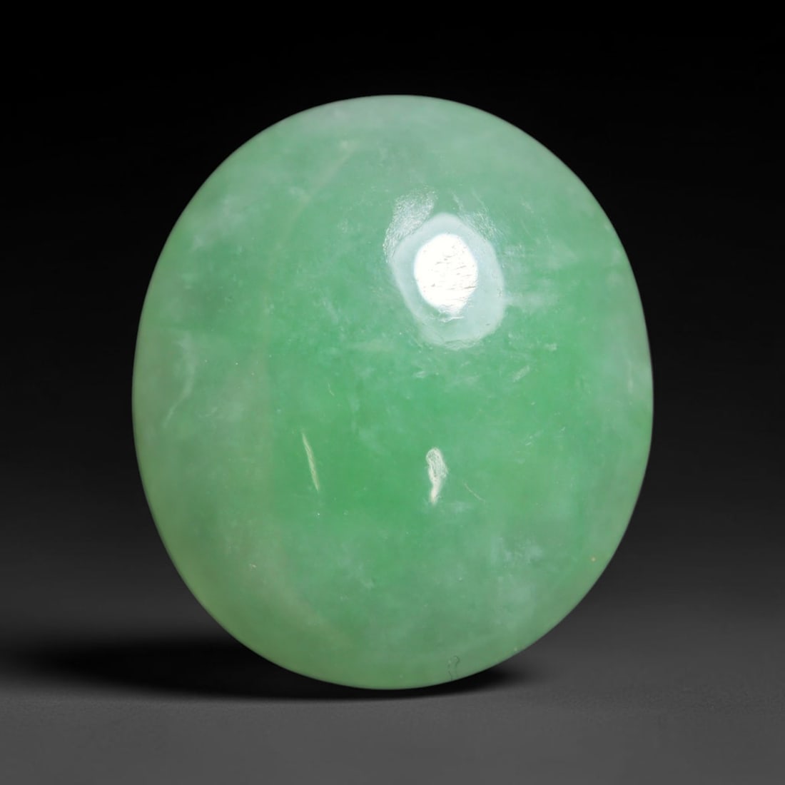 4.35ct Natural Burmese Type A Jadeite Jade Cabochon Loose Gemstone, 56BT: This smoothly polished cabochon is genuine Type A Burmese jadeite jade. It displays soft, even green saturation with gentle natural tonal variation across the polished surface, featuring a fine compac