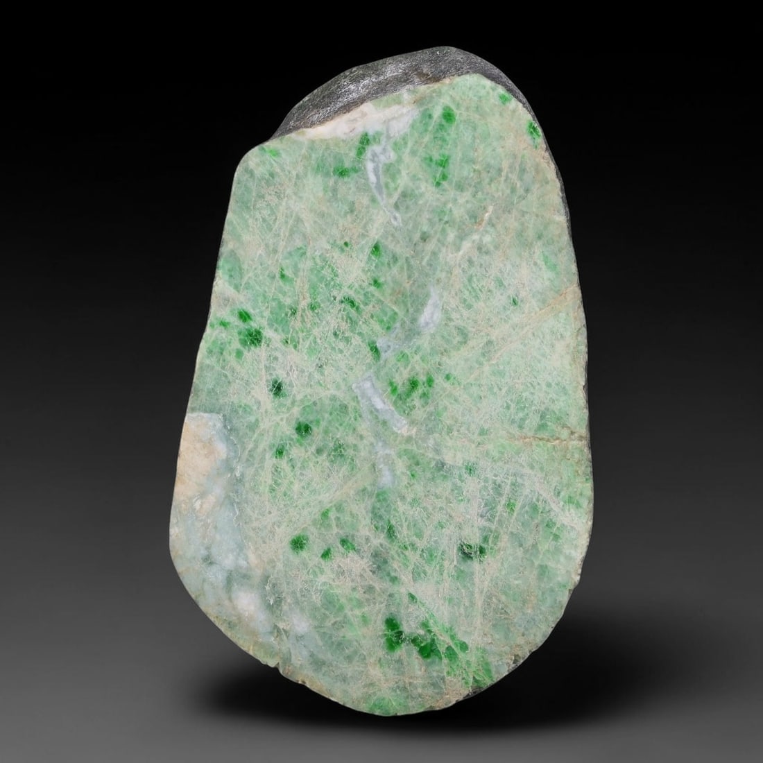 340ct Natural Type A Burmese Jadeite Jade Sliced Rough, 37AZ: This specimen is a sliced rough block of natural Type A Burmese jadeite jade. The interior displays natural colour zoning with visible mineral veining and crystalline patterns typical of unprocessed j