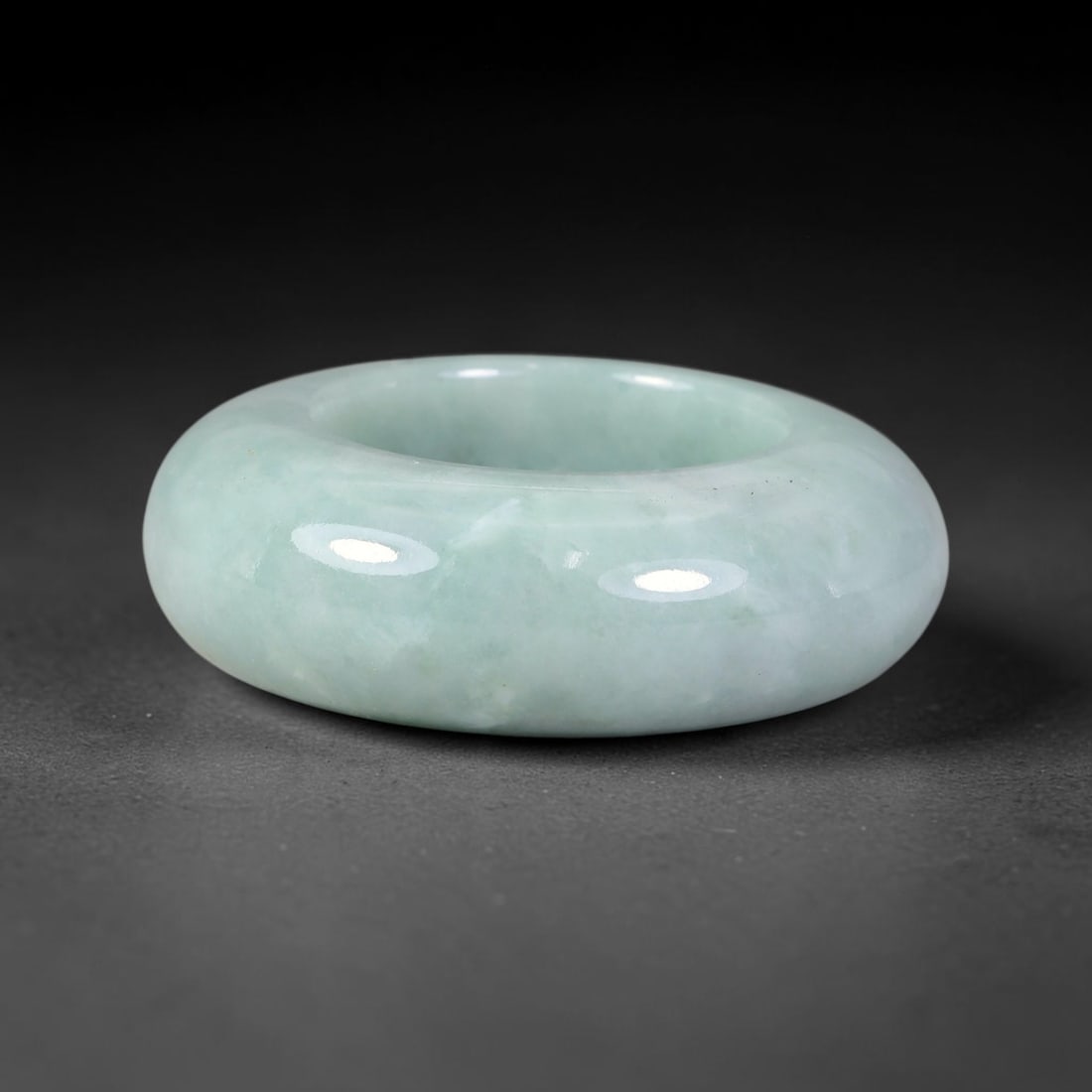 Natural Burmese Type A Jadeite Jade Wide Band Ring, 6BK: Polished untreated Burmese Type A jadeite jade wide band ring, US ring size 12.75 with a substantial band width of 12 mm. The jadeite features a soft pale mint green base naturally streaked with flowi