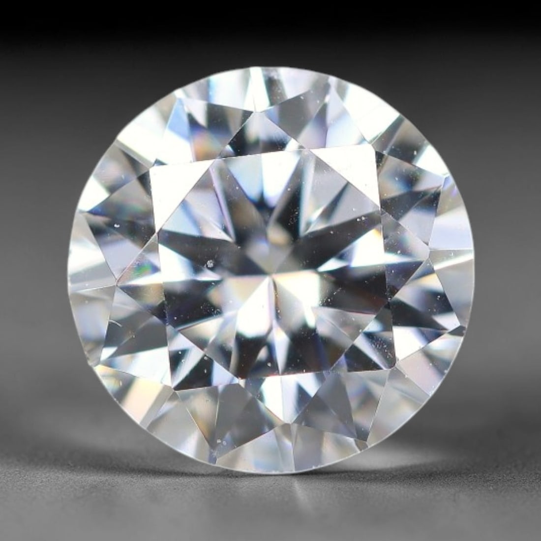 0.95 Carats Natural Clear White Moissanite Loose Gemstone, 13FL: This clear white moissanite carries dimension specs of 6.4x3.8mm, exhibiting outstanding light dispersion that produces vivid, multi-faceted sparkle across its transparent body, with sparse tiny micro