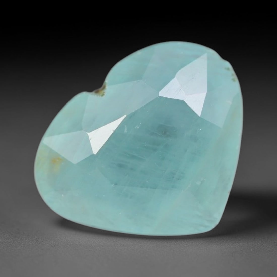 1.57ct Natural Madagascan Faceted Grandidierite Rare Loose Gemstone, 90AS: This expertly faceted finished grandidierite holds soft translucent body tone with fine faint natural internal veining visible beneath precisely cut reflective facets within its 9.5x7.5x3.7mm calibrat
