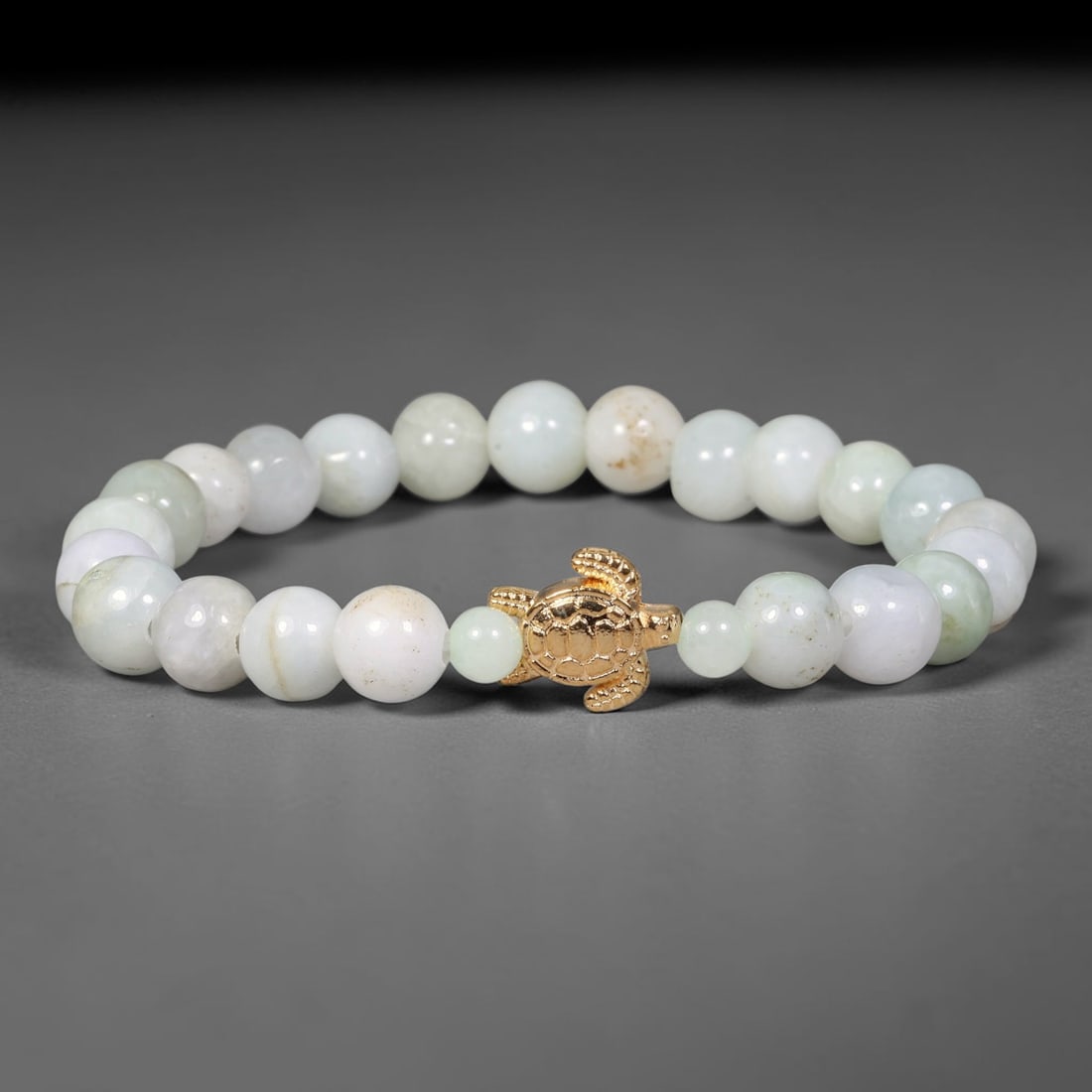 Natural Burmese Type A Jadeite Jade Beaded Bracelet, 38EP: Polished natural jadeite jade round beads complemented by decorative crystal spacer accents. Uniform 8mm beads form a flexible wearable strand. A timeless gemstone bracelet suitable for daily styling,