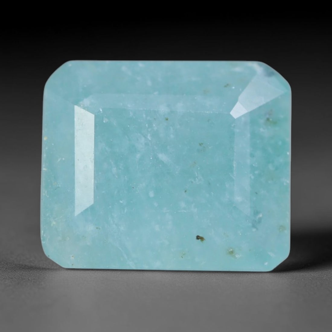 5.81ct Natural Madagascan Faceted Grandidierite Rare Loose Gemstone, 63BD: This expertly faceted finished grandidierite holds soft translucent body tone with fine faint natural internal veining visible beneath precisely cut reflective facets within its 11.5x9.8x6mm calibrate