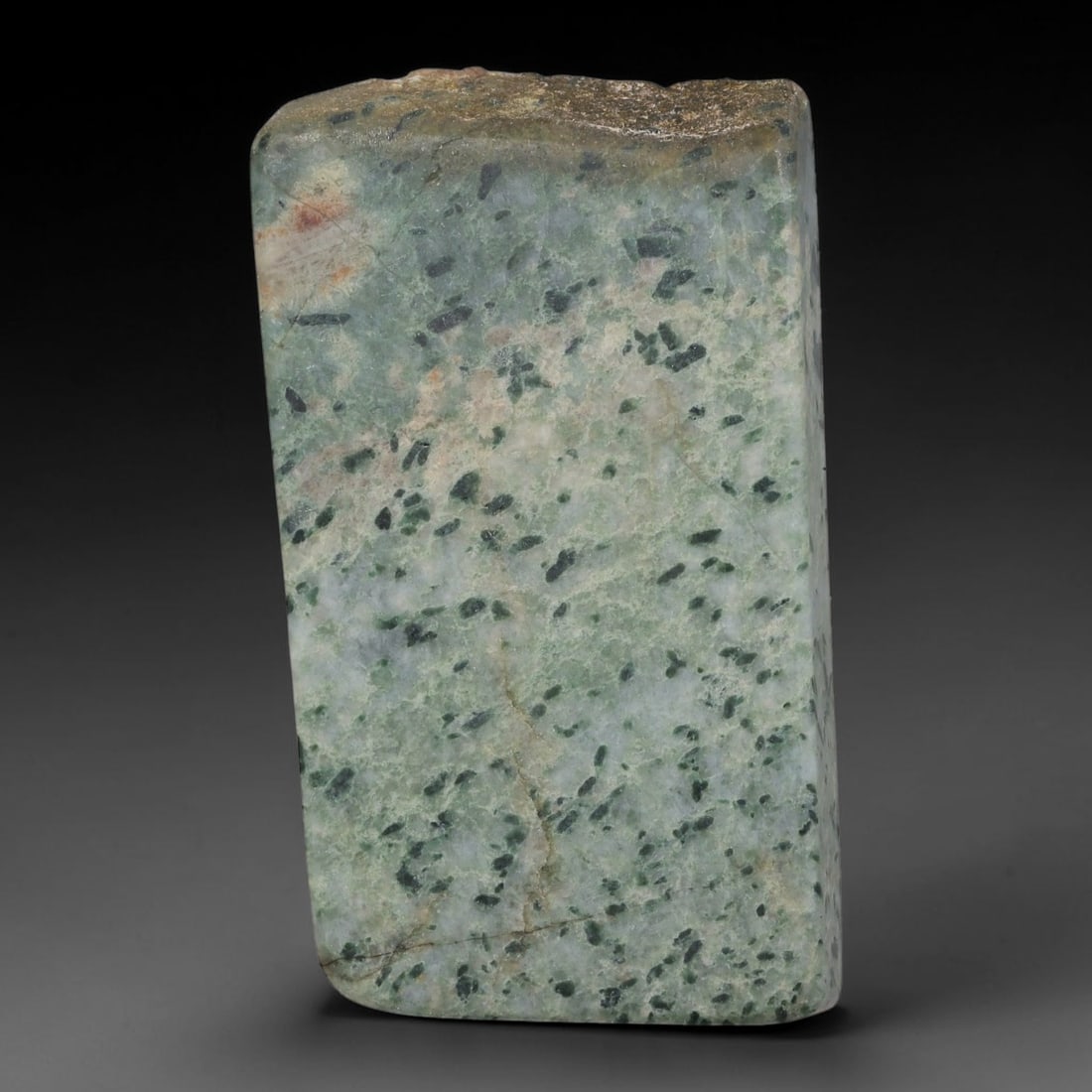 310ct Natural Type A Burmese Jadeite Jade Sliced Rough, 73FB: This specimen is a sliced rough block of natural Type A Burmese jadeite jade. The interior displays natural colour zoning with visible mineral veining and crystalline patterns typical of unprocessed j