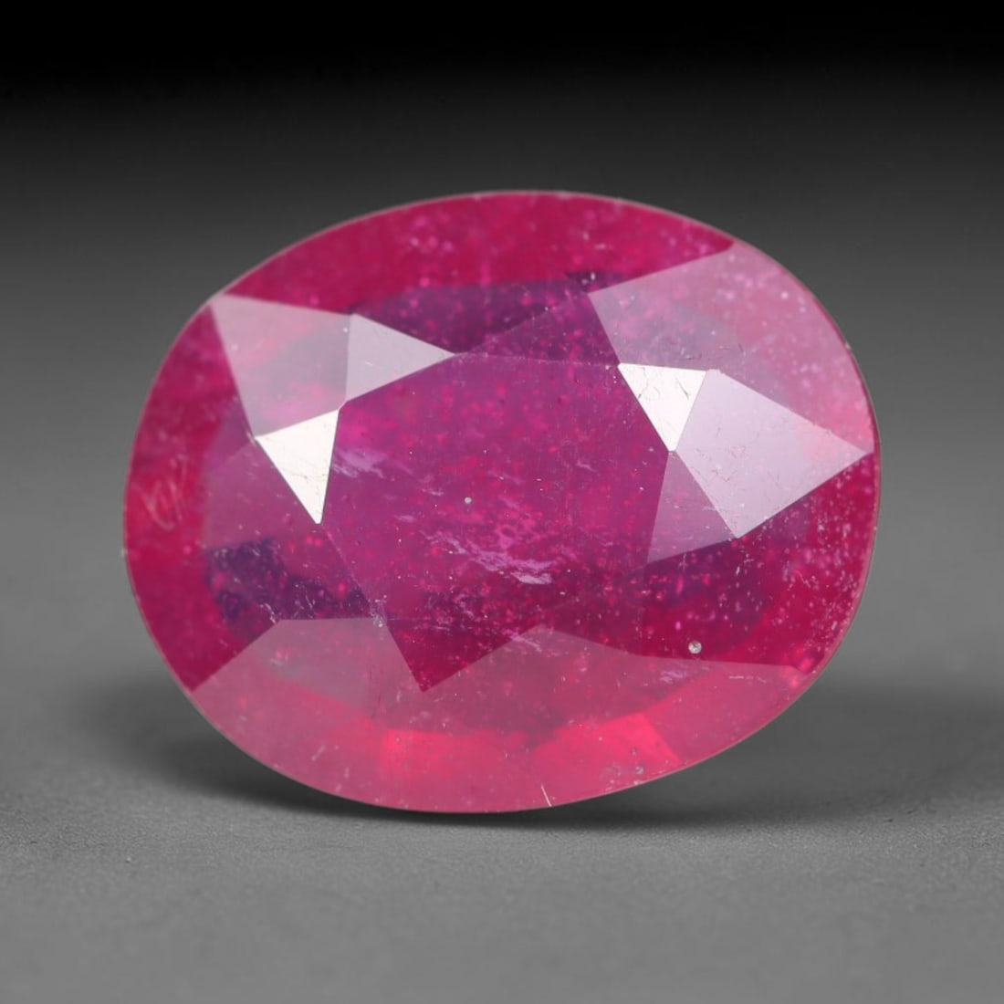 3.26ct Natural Madagascar Vivid Magenta Red Ruby Loose Gemstone, 35BA: This vivid magenta-hued Madagascar ruby boasts rich saturated red-pink saturation scattered with tiny fine mineral specks and distinct two-phase fluid bubble inclusions throughout its translucent crys