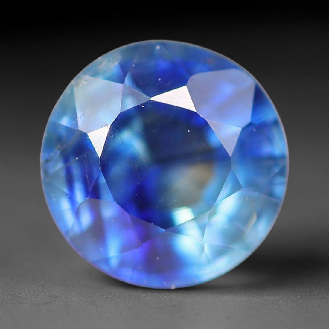 0.55ct Natural Rich Royal Blue Faceted Sapphire Loose Gemstone, 80BF: This fully polished sapphire boasts vivid saturated royal blue body tone, dotted with tiny natural microscopic mineral specks inside its transparent crystal structure, with calibrated dimensions measu