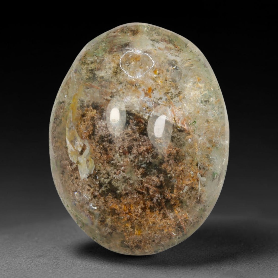25ct Natural Brazilian Phantom Quartz Oval Cabochon Loose Gemstone, 96BM: This smoothly polished cabochon of natural phantom quartz preserves delicate layered phantom crystal formations enclosed inside transparent quartz host. The domed polished surface offers unobstructed 