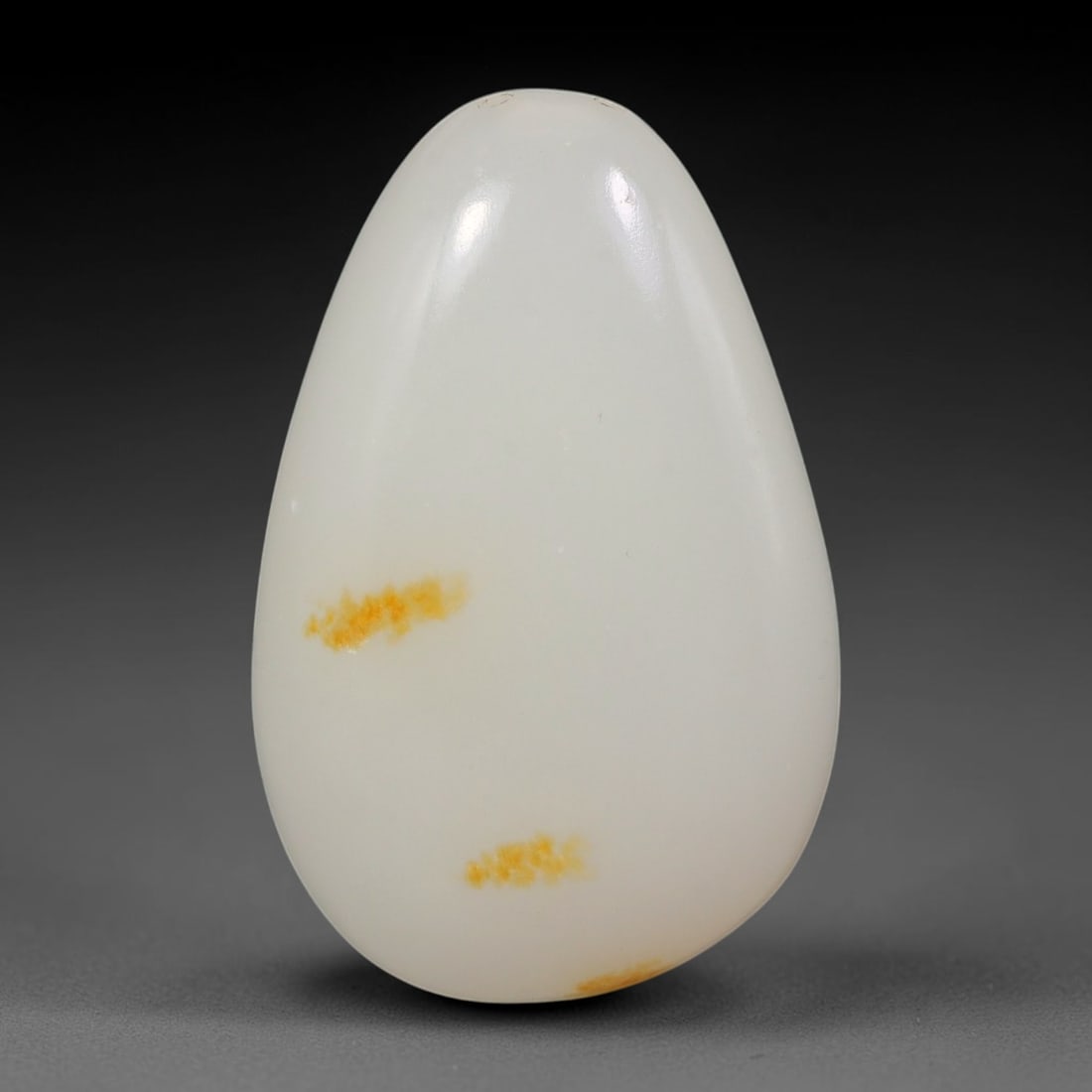 Vintage White Nephrite Jade Pebble - Chinese Wearable Pendant Stone, 65AS: Crafted from solid white nephrite jade pebble, this piece features uniformly hand-polished rounded contours executed in traditional Chinese jade buffing techniques. A clean suspension drill hole is se