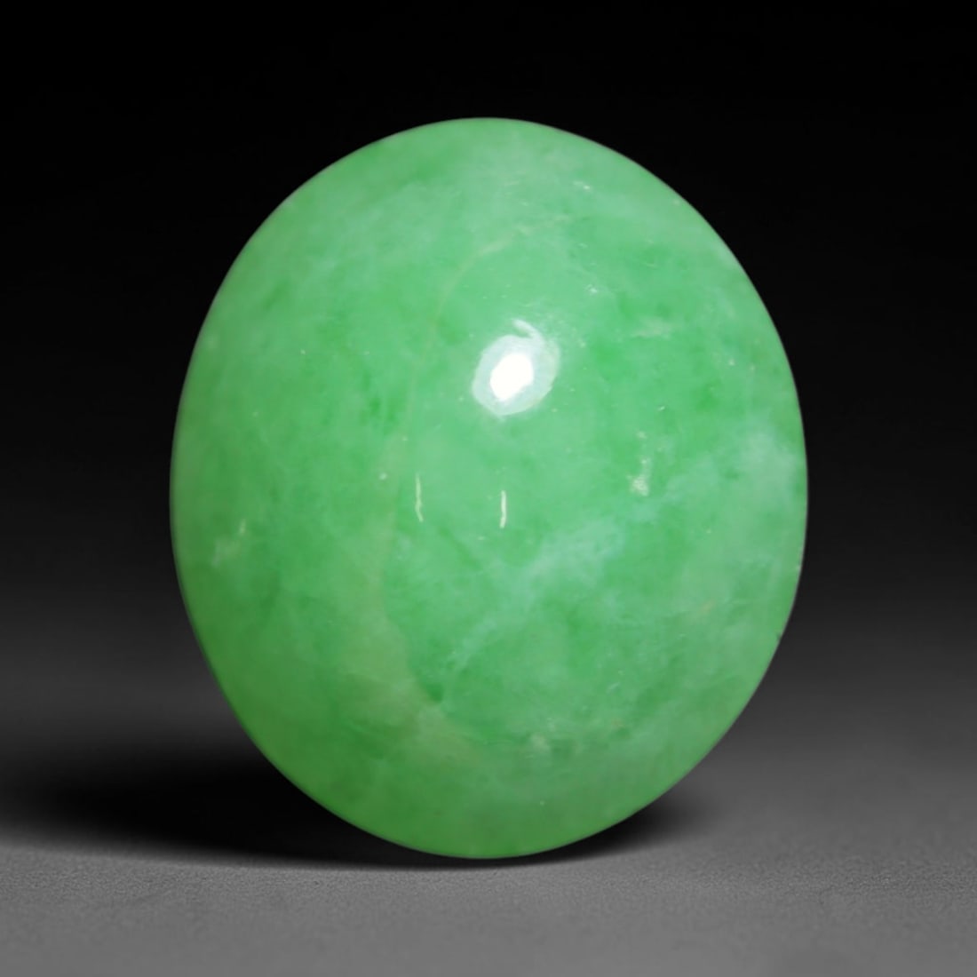 3.34ct Natural Burmese Type A Jadeite Jade Cabochon Loose Gemstone, 40BT: This smoothly polished cabochon is genuine Type A Burmese jadeite jade. It displays soft, even green saturation with gentle natural tonal variation across the polished surface, featuring a fine compac