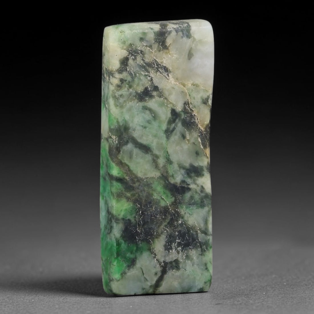 124ct Natural Type A Burmese Jadeite Jade Sliced Rough, 55FB: This specimen is a sliced rough block of natural Type A Burmese jadeite jade. The interior displays natural colour zoning with visible mineral veining and crystalline patterns typical of unprocessed j